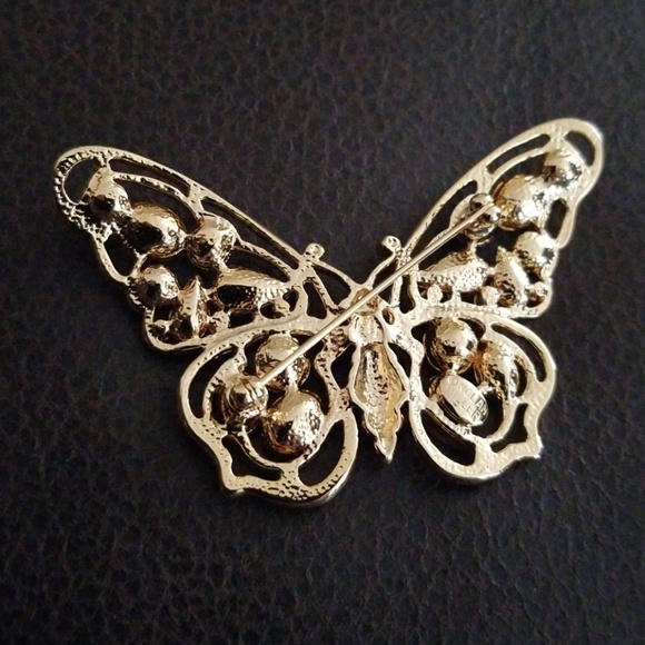 Nolan Miller pin brooch
